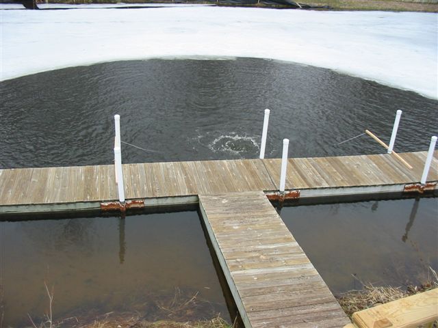 Dock de-icers, dock bubblers, and ice eaters. How winter ice affects dock, marinas, and boats.